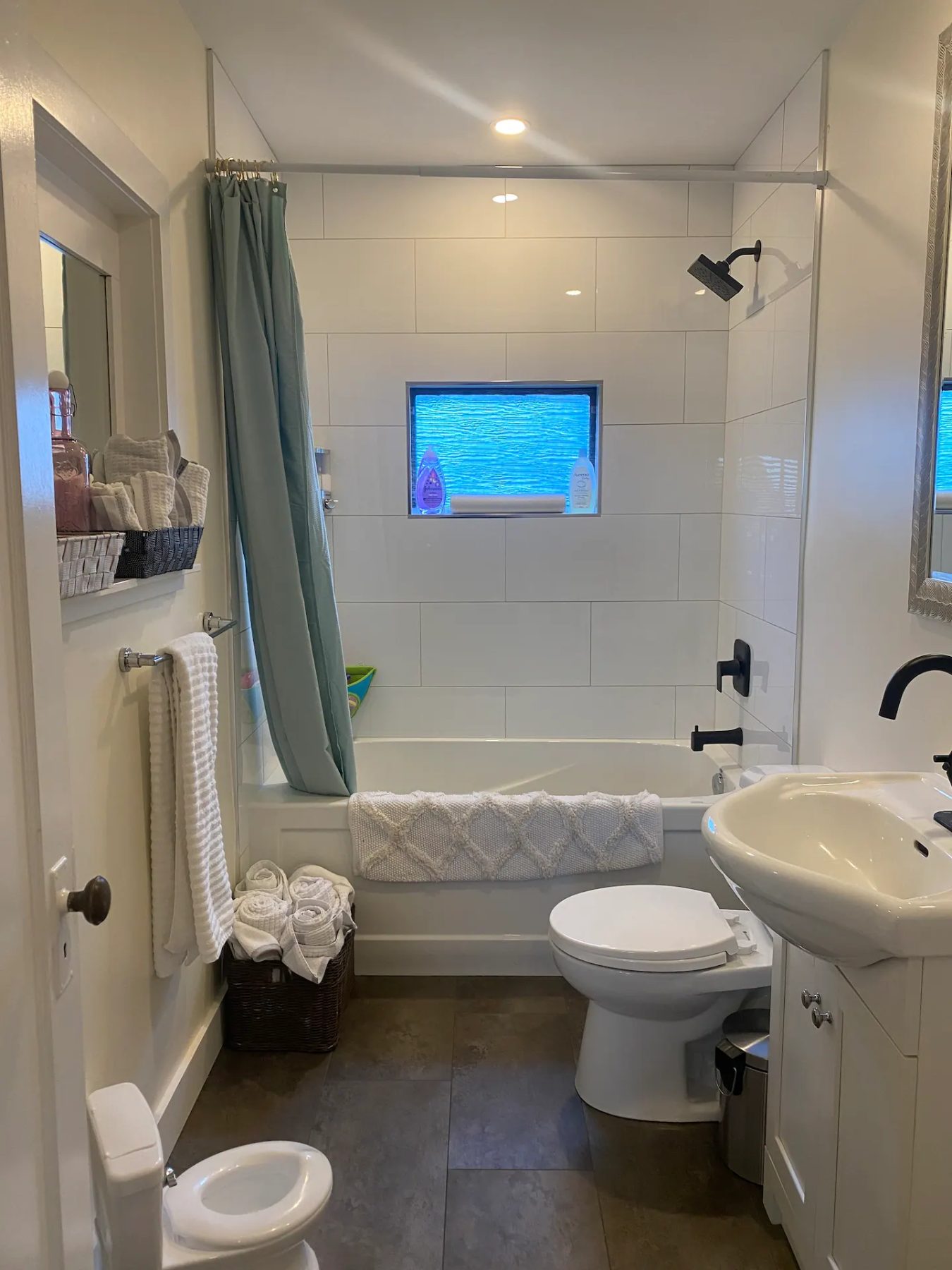 Bathroom with tub and shower
